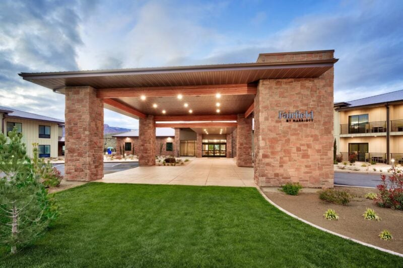 Hotel porte-cochère entrance with lawn in front